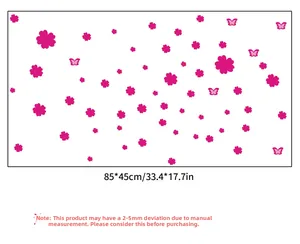 Detail of pink floral and butterfly wall stickers with size measurements of 85x45 cm