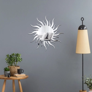 Modern acrylic mirror wall sticker with sunburst design in a minimalist living room setting