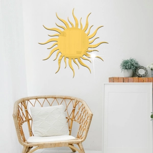 Golden acrylic sun mirror wall sticker reflecting light in a modern white bedroom decor