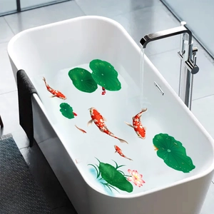 Modern bathroom decor showing koi fish and lotus wall decals on a white bathtub