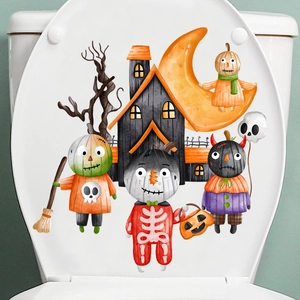 Halloween toilet seat decal featuring pumpkin character and ghost on a white cover