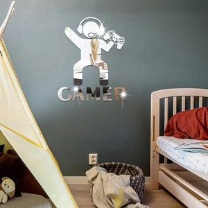 Detail showing mirrored acrylic gamer wall sticker on a dark grey bedroom background