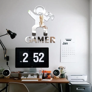 Close-up of silver gamer silhouette acrylic wall sticker with reflective mirror surface