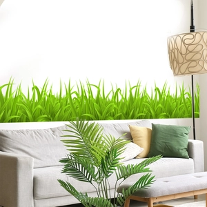 Realistic green grass wall sticker decals for living room decor over gray sofa