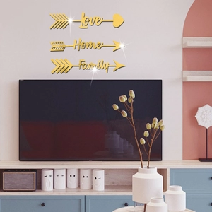 Three-piece set of golden acrylic mirror arrow stickers featuring Love, Home, and Family
