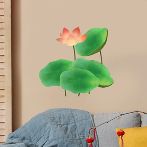 Detail view of pink lotus flower and green lily pads wall decals in a modern living room