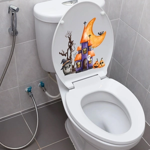 Halloween toilet seat decal featuring purple castle, moon, and pumpkin lantern designs