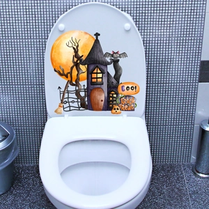 Detail of Halloween toilet lid sticker featuring a purple castle, moon, and bats motifs
