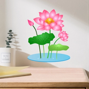Detail view of pink lotus wall decals with green leaves and a blue pond on white walls