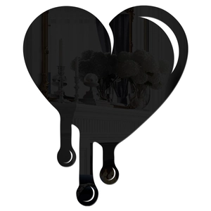 Detail of black mirror acrylic wall sticker featuring a unique heart drip art design
