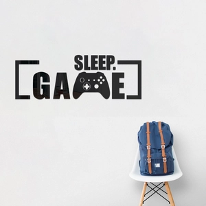 Macro detail of black acrylic 3D game wall decal with mirror finish SLEEP GAME text