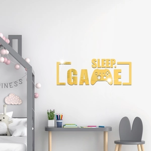 Detail of mirror gold acrylic wall sticker with SLEEP GAME letters and game controller