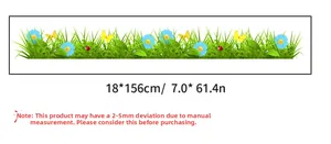 Detail of green grass wall sticker with blue flowers and ladybugs, size 18x156cm