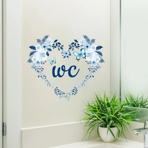 Sticker mural couronne de fleurs bleue et blanche en cœur avec signe WC pour salle de bain
