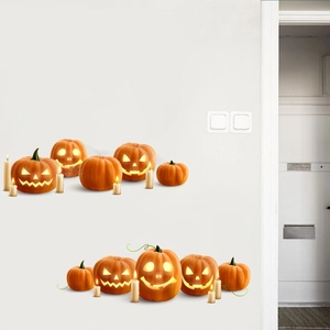 Halloween Jack-o'-lantern and candle wall decals decorating a plain white interior wall
