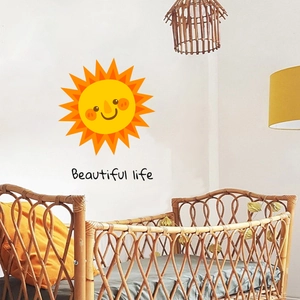 Smiling cartoon sun wall decal with Beautiful Life text for a cozy nursery wall