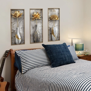 Three-piece set of 3D wall art stickers featuring golden lotus flowers in modern vases