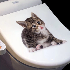 Detailed view of 3D cat wall sticker on a white toilet lid for bathroom decor