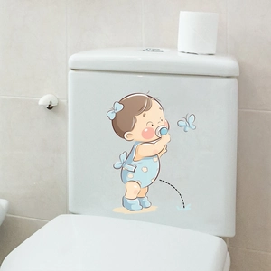 Detail view of a cute cartoon boy and blue butterfly sticker on a white ceramic toilet tank