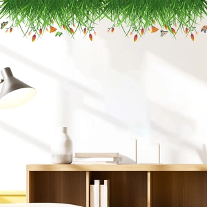 Détail de stickers muraux plantes vertes et fleurs dans un décor de salon moderne et épuré