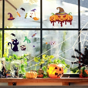 Halloween window stickers set with pumpkin, ghost and black cat for festive room decoration