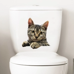 3D realistic tabby cat sticker on toilet tank with lifelike fur and bright yellow eyes