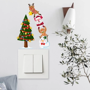 Christmas wall stickers featuring Santa and Reindeer above a double light switch panel