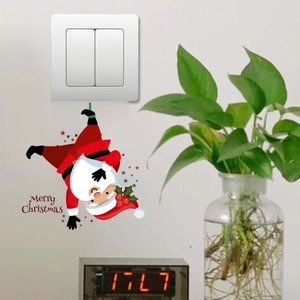 Christmas switch wall sticker featuring a cute Santa Claus and Merry Christmas text decor