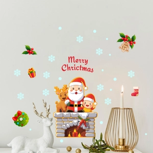 Détail de stickers muraux de Noël avec Père Noël sur cheminée et texte Merry Christmas
