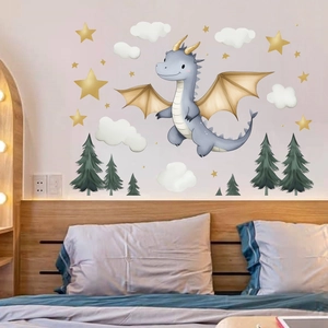 Detailed view of cute dinosaur and golden star wall decals in a cozy kids nursery room