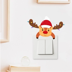 Cute Christmas reindeer switch sticker with festive hat and colorful lights on a wall