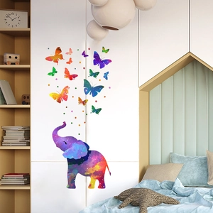 Dreamy galaxy themed wall decals featuring a colorful elephant and butterflies for room decor