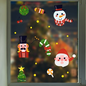 Christmas window decals with Santa Claus, Snowman and Nutcracker on glass surface