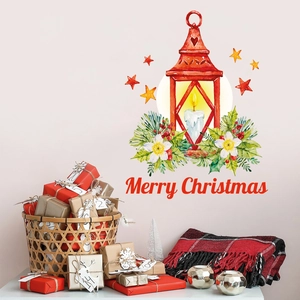 Detail of Christmas wall sticker featuring a red lantern with candle and pine needles