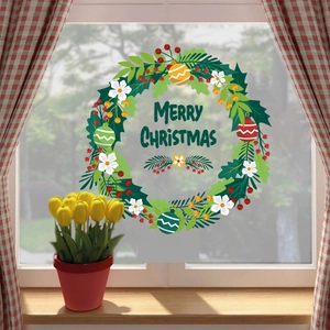 Festive Christmas wreath wall sticker with Merry Christmas text on a glass window