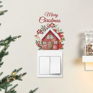 Detailed view of Christmas switch stickers featuring a red house and Merry Christmas text