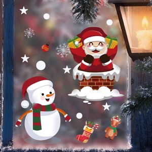 Detailed view of Christmas window stickers featuring Santa and Snowman on frosted glass
