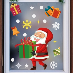 Christmas window stickers featuring Santa Claus holding a green gift box with snowflakes