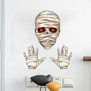 Creepy Halloween mummy wall decal with glowing red eyes for spooky home wall decoration