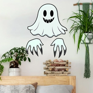 Stickers muraux fantôme avec tête et griffes présentés dans une chambre chaleureuse
