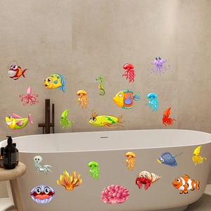 Luminous ocean creature decals showing colorful clownfish and jellyfish on bathroom walls