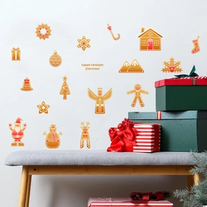 Festive Christmas wall stickers with gingerbread style Santa and Reindeer on a white wall