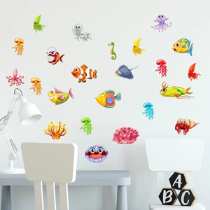 Detailed view of colorful luminous ocean animal wall stickers in a child's bedroom setting