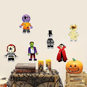 Glow-in-the-dark Halloween wall stickers featuring cartoon ghost and monster designs