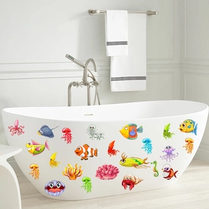 Luminous marine life wall decals featuring cartoon jellyfish and clownfish for bathroom decor