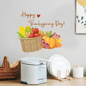 Macro detail of Happy Thanksgiving wall decal with pumpkins and corn on a wall