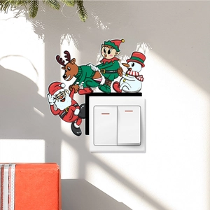 Festive Christmas light switch stickers featuring Santa, reindeer, and snowman characters