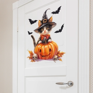 Detail of Halloween magic cat and pumpkin door sticker on white interior door background