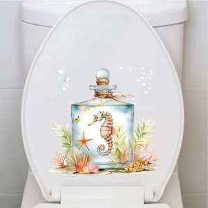 Detailed sea horse and starfish in a bottle wall decal applied to a white toilet lid cover