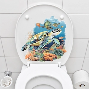 Detail of 3D sea turtle and coral reef waterproof wall sticker applied on a white toilet lid